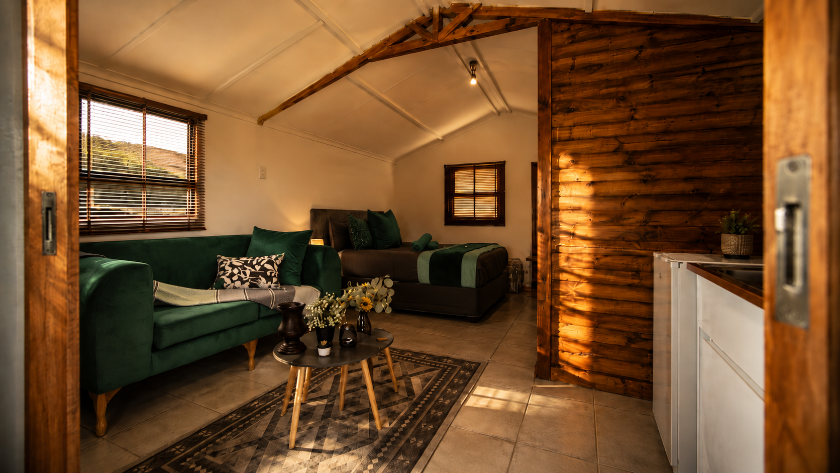 Caleb's Farm Cabins interior lounge and bedroom